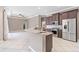 Beautiful open kitchen with granite countertops, stainless appliances and breakfast bar at 8521 30Th E St, Parrish, FL 34219