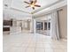 Open-concept living space with tile flooring and access to kitchen at 8521 30Th E St, Parrish, FL 34219