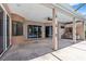 Covered outdoor patio with a built-in kitchen, ceiling fan and views of the pool at 8521 30Th E St, Parrish, FL 34219