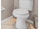 Bathroom featuring white toilet seat and tiled floor at 8521 30Th E St, Parrish, FL 34219