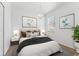 Carpeted bedroom with overhead chandelier, two wall pictures and a large window at 9418 W Park Village Dr # 105, Tampa, FL 33626
