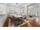 Elegant dining area with modern decor, a stylish table, and an open concept design for entertaining at 9418 W Park Village Dr # 105, Tampa, FL 33626