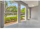 Open porch with painted concrete flooring and a scenic view at 9418 W Park Village Dr # 105, Tampa, FL 33626