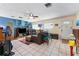 Inviting living room with bright tile flooring, ample natural light, and open layout at 9602 N Rome Ave, Tampa, FL 33612