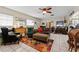 Cozy living room with colorful rug, plush seating, and ample space for entertaining guests at 9602 N Rome Ave, Tampa, FL 33612