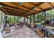Enclosed patio featuring tiling and string lights at 9602 N Rome Ave, Tampa, FL 33612