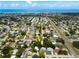 Home's prime location in a quiet neighborhood with lush trees and proximity to the waterfront at 10095 Oakhurst Rd, Seminole, FL 33776