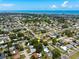 Beautiful home from above with nearby ocean view and convenient neighborhood at 10095 Oakhurst Rd, Seminole, FL 33776