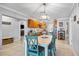 Bright dining area adjacent to the kitchen, featuring a dining table and plenty of natural light, perfect for Gathering at 10095 Oakhurst Rd, Seminole, FL 33776