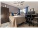 Comfortable bedroom with neutral tones, ample closet space, and a bright window at 10423 Carrollbrook Cir # 203, Tampa, FL 33618