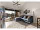 Cozy living room with vaulted ceilings, comfortable seating, and a scenic view from the patio at 10423 Carrollbrook Cir # 203, Tampa, FL 33618