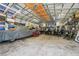 Large garage with multiple vehicles, boats, motorcycles and plenty of storage at 10614 Hudson Ave, Hudson, FL 34669
