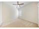 Neutral bedroom with new carpet, ceiling fan, and shuttered window for temperature and light control at 10751 Tavistock Dr, Tampa, FL 33626