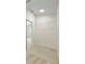 Walk-in closet with neutral carpet and wire shelving for optimal storage solutions at 10751 Tavistock Dr, Tampa, FL 33626