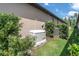 Exterior view of home featuring backup generator at 11039 Calluna Dr, Odessa, FL 33556