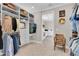 Spacious walk-in closet with custom shelving and organization system at 11039 Calluna Dr, Odessa, FL 33556