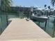 Dock with boat and boat lift on canal at 11110 1St E St, Treasure Island, FL 33706
