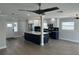 Spacious open-concept kitchen featuring a large island, stainless steel appliances, and ample natural light at 11110 1St E St, Treasure Island, FL 33706