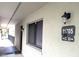 Exterior shot showing unit number with nearby doorway entrance at 11705 Raintree Village Blvd # C, Temple Terrace, FL 33617