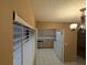 An open kitchen area featuring laminate countertops, appliances, and cabinetry at 11705 Raintree Village Blvd # C, Temple Terrace, FL 33617