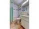 Bathroom featuring tiled walls, shower with tub, and a vanity with sink at 12004 Plantain Ct, Tampa, FL 33635