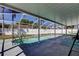 Backyard pool featuring screened enclosure, and surrounding patio at 12004 Plantain Ct, Tampa, FL 33635