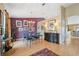 Elegant dining room features a modern chandelier, stylish decor, and a colorful area rug on hardwood floors at 13238 Asbury St, Spring Hill, FL 34609