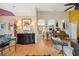 Open-concept living area with hardwood floors, tasteful decor, and bright, airy ambiance at 13238 Asbury St, Spring Hill, FL 34609