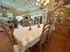 Bright and spacious dining area open to the living room and kitchen at 13807 Eagles Rock Ct, Hudson, FL 34667