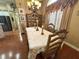 This spacious formal dining room boasts hardwood floors and elegant furnishings at 13807 Eagles Rock Ct, Hudson, FL 34667
