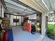 Garage features ample storage solutions, including cabinets and shelving for organization at 13807 Eagles Rock Ct, Hudson, FL 34667
