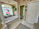 Bathroom featuring a stained-glass window and a relaxing soaking tub at 13807 Eagles Rock Ct, Hudson, FL 34667
