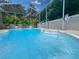 Inviting pool with clear blue water and plenty of room to swim at 13807 Eagles Rock Ct, Hudson, FL 34667
