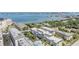 Aerial view of multi-story buildings and water at 147 Bluff View Dr # 105, Belleair Bluffs, FL 33770