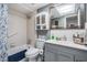 Bathroom featuring neutral finishes, a shower-tub combination, and a vanity sink at 147 Bluff View Dr # 105, Belleair Bluffs, FL 33770