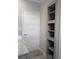Stylish bathroom with a vanity and built-in shelving at 15591 Charmwood Dr, Hudson, FL 34667