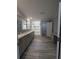 Bathroom with double vanity, shower, toilet room, and makeup vanity at 15591 Charmwood Dr, Hudson, FL 34667
