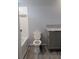 Bathroom featuring a toilet, tub, and sink with modern finishes at 15591 Charmwood Dr, Hudson, FL 34667