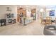 Open kitchen with a large island, stainless steel appliances, and adjacent dining area for entertaining at 1669 Ludington Ave, Wesley Chapel, FL 33543