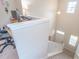 Bright loft with a functional desk and good light from the entryway below at 1669 Ludington Ave, Wesley Chapel, FL 33543