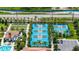 Aerial view of multiple tennis courts and bocce ball, providing diverse recreational options at 16938 Scuba Crest St, Wimauma, FL 33598