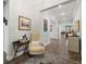 Inviting foyer with wood-look flooring and neutral paint at 16938 Scuba Crest St, Wimauma, FL 33598