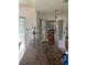Kitchen features an expansive granite counter, perfect for entertaining guests at 1855 Briland St, Tarpon Springs, FL 34689