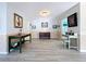 Charming hallway showcasing wood floors and decorative walls at 1861 Royal Oak E Pl, Dunedin, FL 34698