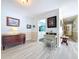 Bright hallway with tiled floors and neutral wall colors at 1861 Royal Oak E Pl, Dunedin, FL 34698