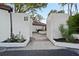 Welcoming entrance featuring lush landscaping and clear signage for the units at 1881 N Hercules Ave # 1501, Clearwater, FL 33765