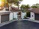 Exterior view of the home showcasing well-maintained landscaping and exterior features at 1881 N Hercules Ave # 1501, Clearwater, FL 33765