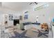 Bright and airy living room featuring built-in shelving and comfortable seating at 1881 N Hercules Ave # 1501, Clearwater, FL 33765