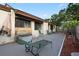 Outdoor patio area with lounge chairs and shade tree at 1881 N Hercules Ave # 1501, Clearwater, FL 33765