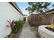 Charming walkway with lush greenery and fencing at 1881 N Hercules Ave # 1501, Clearwater, FL 33765
